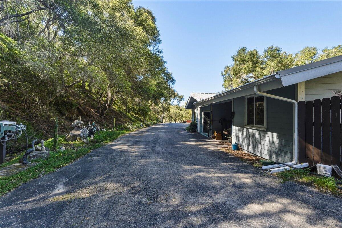 6645 Fern Canyon Road San Luis Obispo, CA 93401 - Photo 25 of 44 a view of a house with a yard and tree s