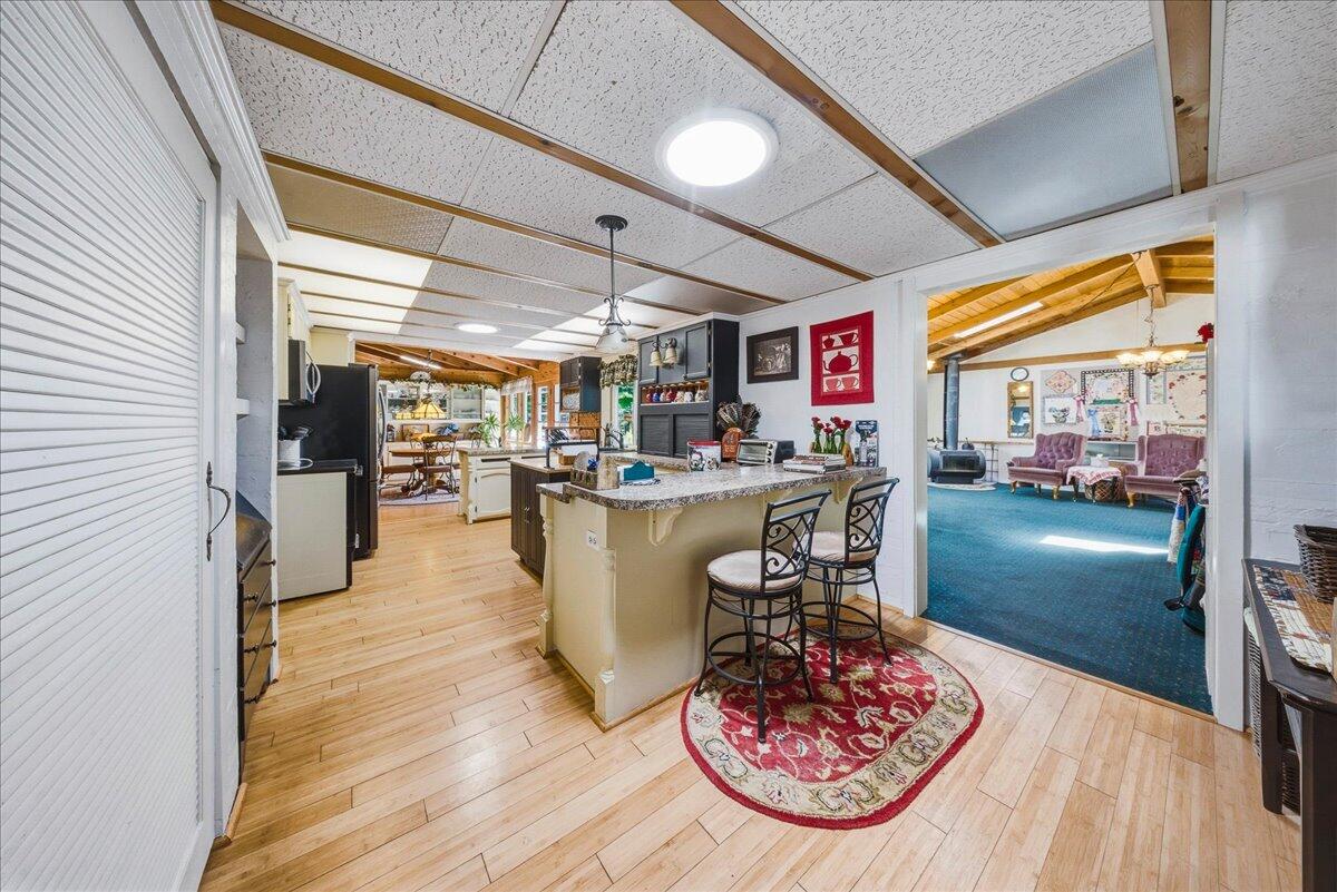 6645 Fern Canyon Road San Luis Obispo, CA 93401 - Photo 28 of 44 a room with lots of wooden furniture