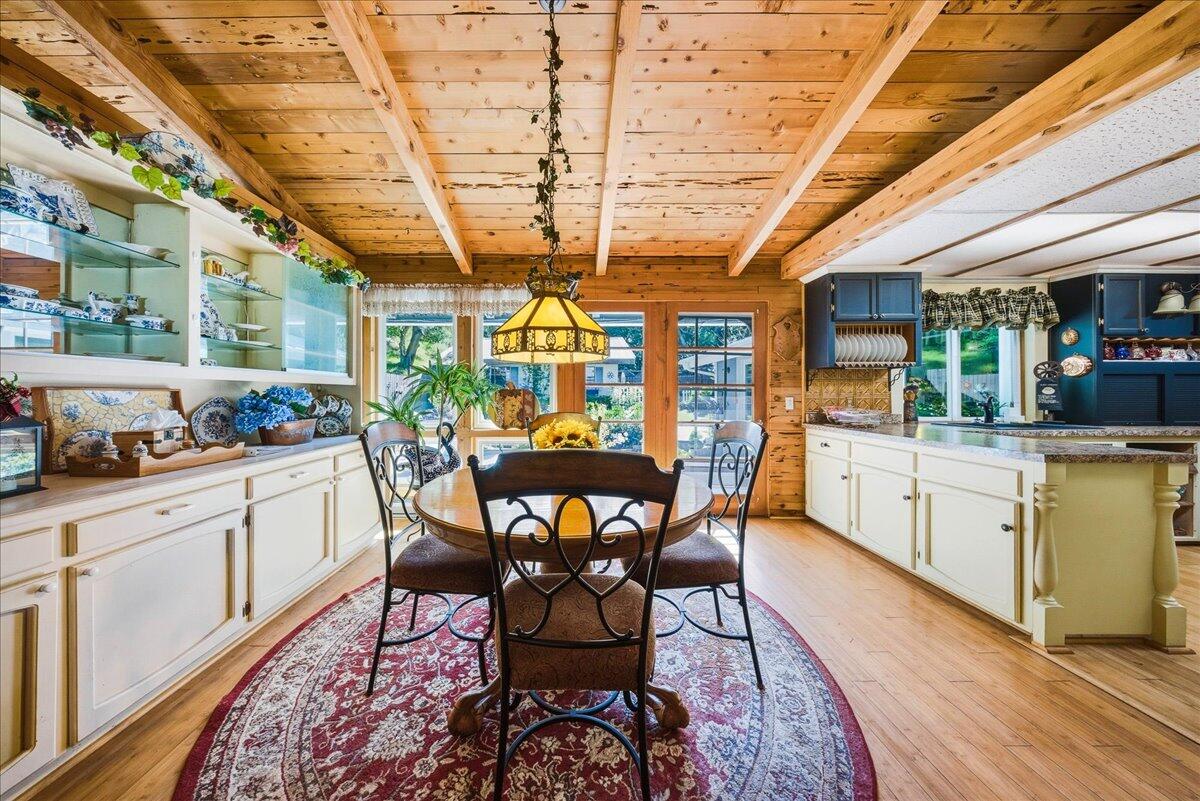 6645 Fern Canyon Road San Luis Obispo, CA 93401 - Photo 33 of 44 a view of a dining room with furniture window and wooden floor