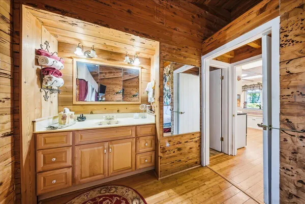 a bathroom with a sink and a mirror