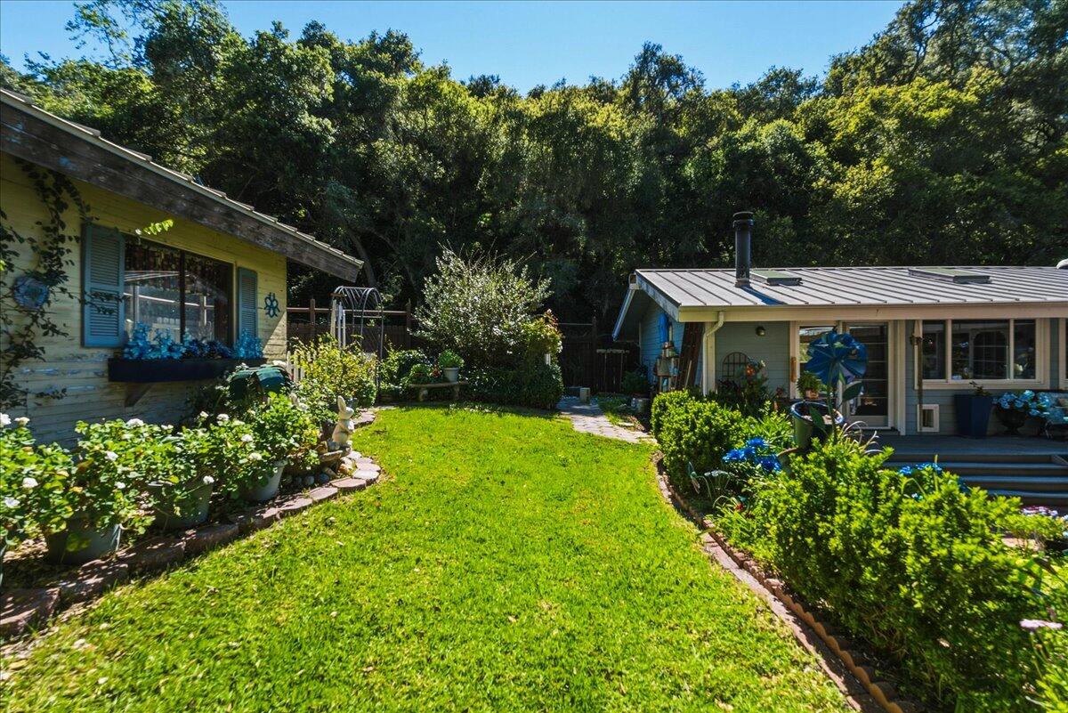 6645 Fern Canyon Road San Luis Obispo, CA 93401 - Photo 43 of 44 a view of a house with a garden and pathway
