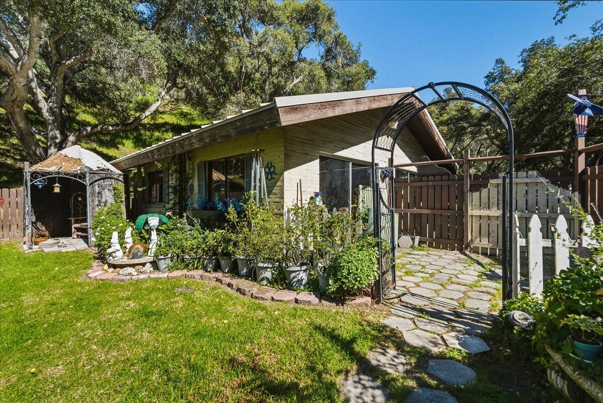6645 Fern Canyon Road San Luis Obispo, CA 93401 - Photo 44 of 44 a front view of a house with garden