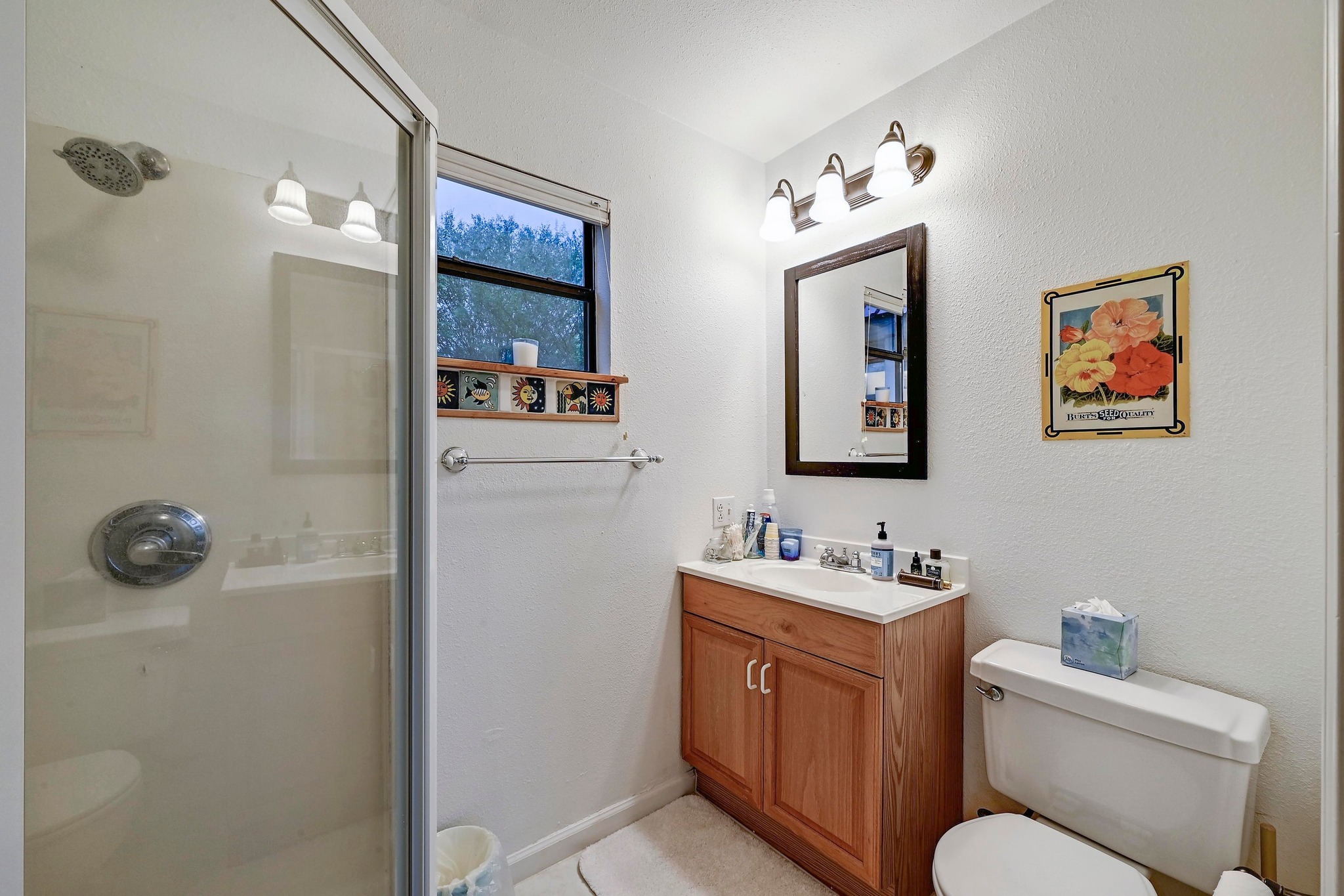 734 Island Drive Bluffton, TX 78607 - Photo 22 of 40 a bathroom with a sink mirror vanity and toilet