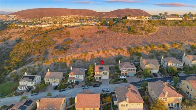 an aerial view of a city with lots of residential buildings