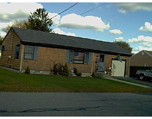 126 Lepes Road Somerset, MA 02726 - Photo 1 of 1 a front view of a house with a yard