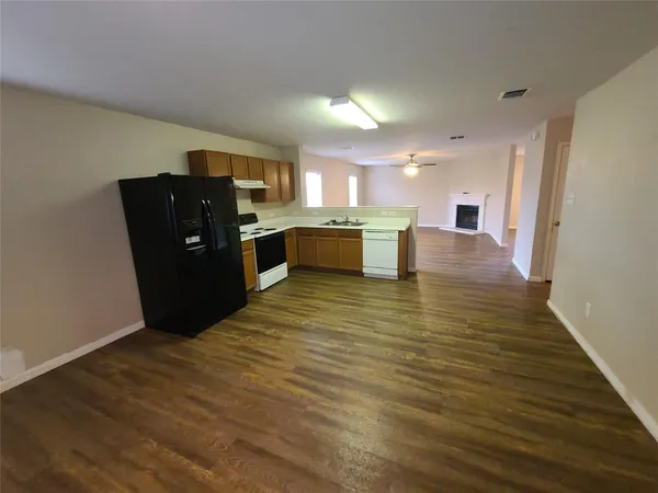 a view of a kitchen with a sink