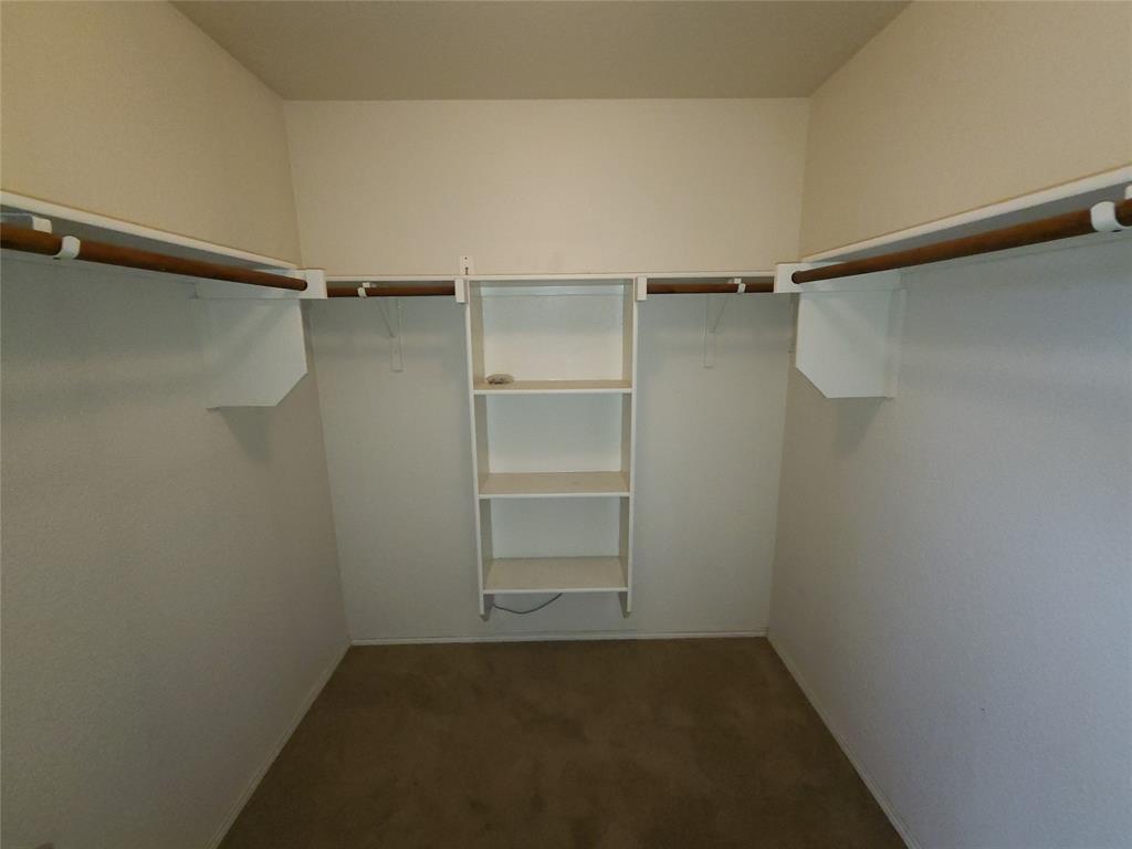 12141 Shine Avenue Rhome, TX 76078 - Photo 19 of 40 a view of an empty walk in closet