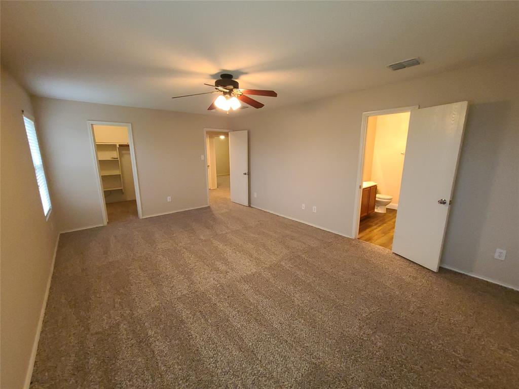 12141 Shine Avenue Rhome, TX 76078 - Photo 23 of 40 a view of an empty room with a window