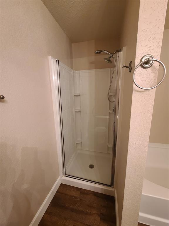 12141 Shine Avenue Rhome, TX 76078 - Photo 26 of 40 a bathroom with a shower