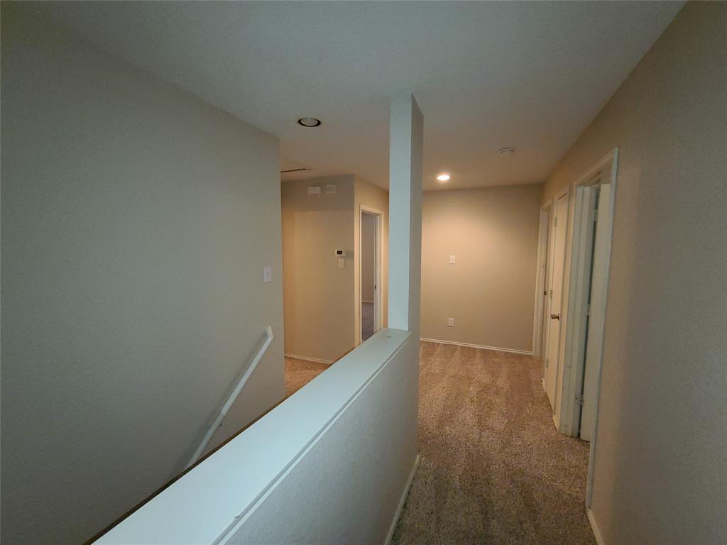 12141 Shine Avenue Rhome, TX 76078 - Photo 35 of 40 a view of hallway with wooden floor