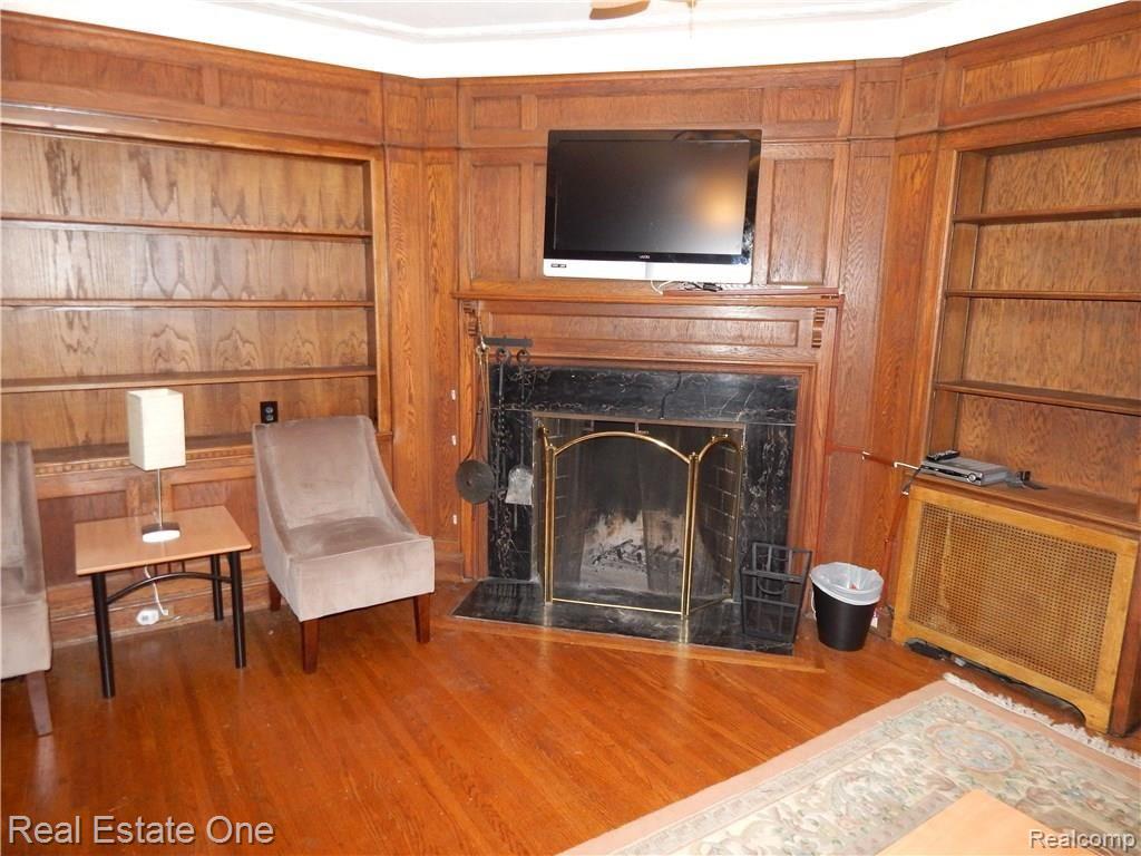 19265 Canterbury Road Detroit, MI 48221 - Photo 16 of 41 Library fireplace