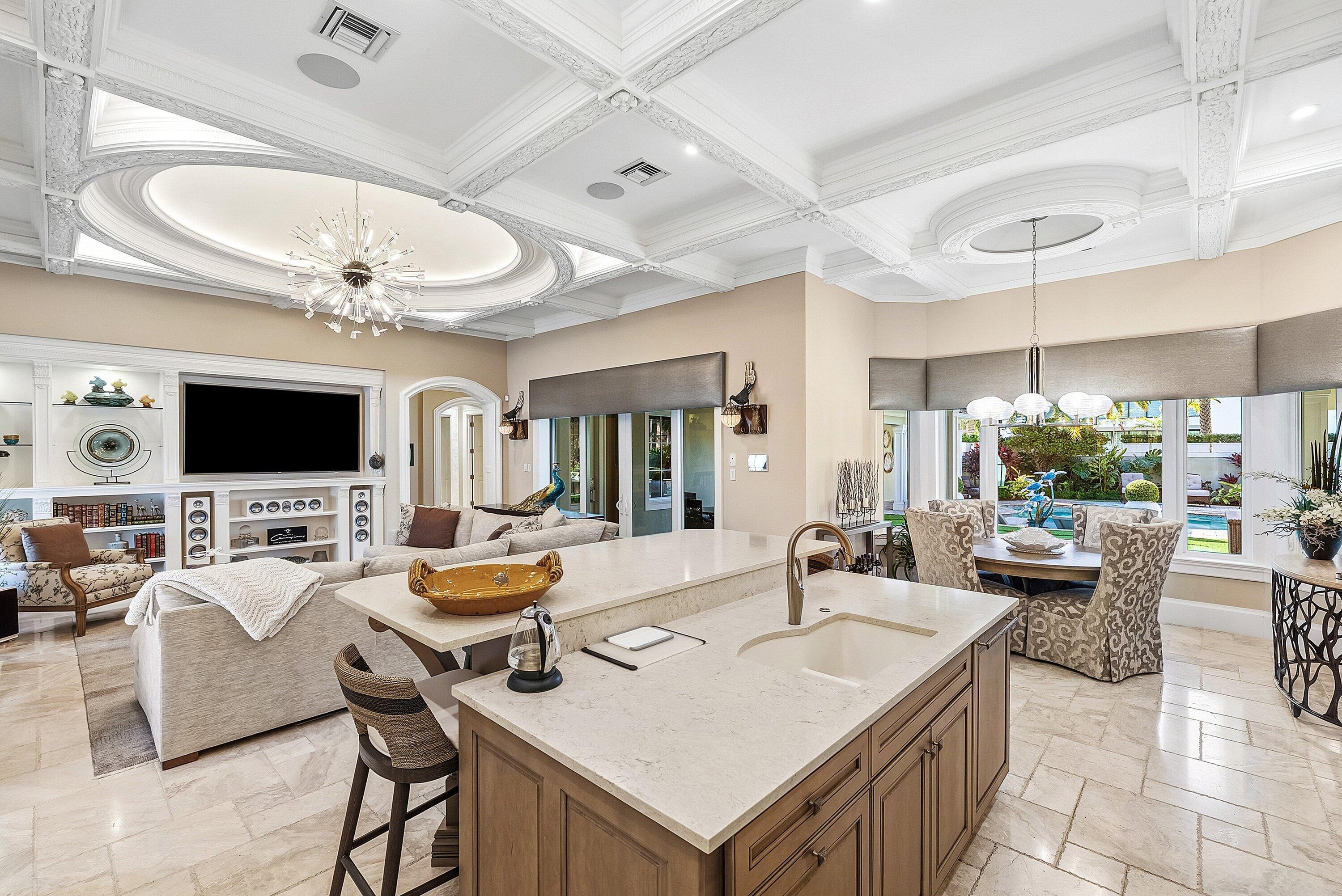 201 Northeast 3rd Court Boca Raton, FL 33432 - Photo 16 of 84 a living room with furniture and a flat screen tv