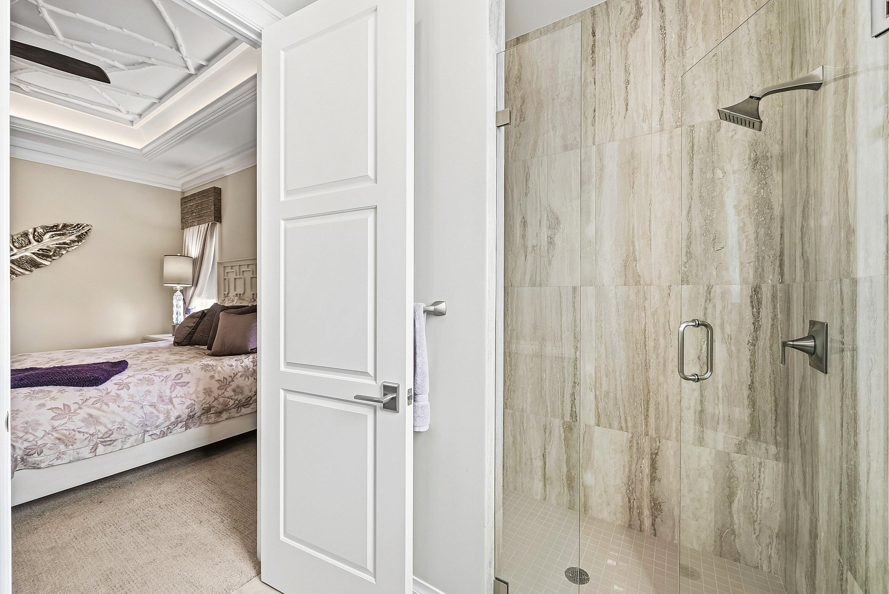 201 Northeast 3rd Court Boca Raton, FL 33432 - Photo 27 of 84 a bedroom with a bed and a shower