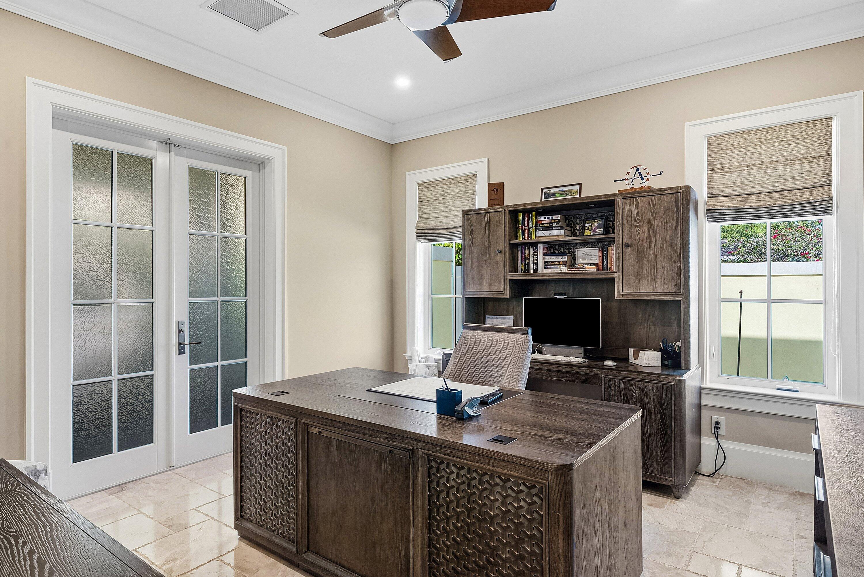 201 Northeast 3rd Court Boca Raton, FL 33432 - Photo 29 of 84 a view of a workspace with furniture and a window
