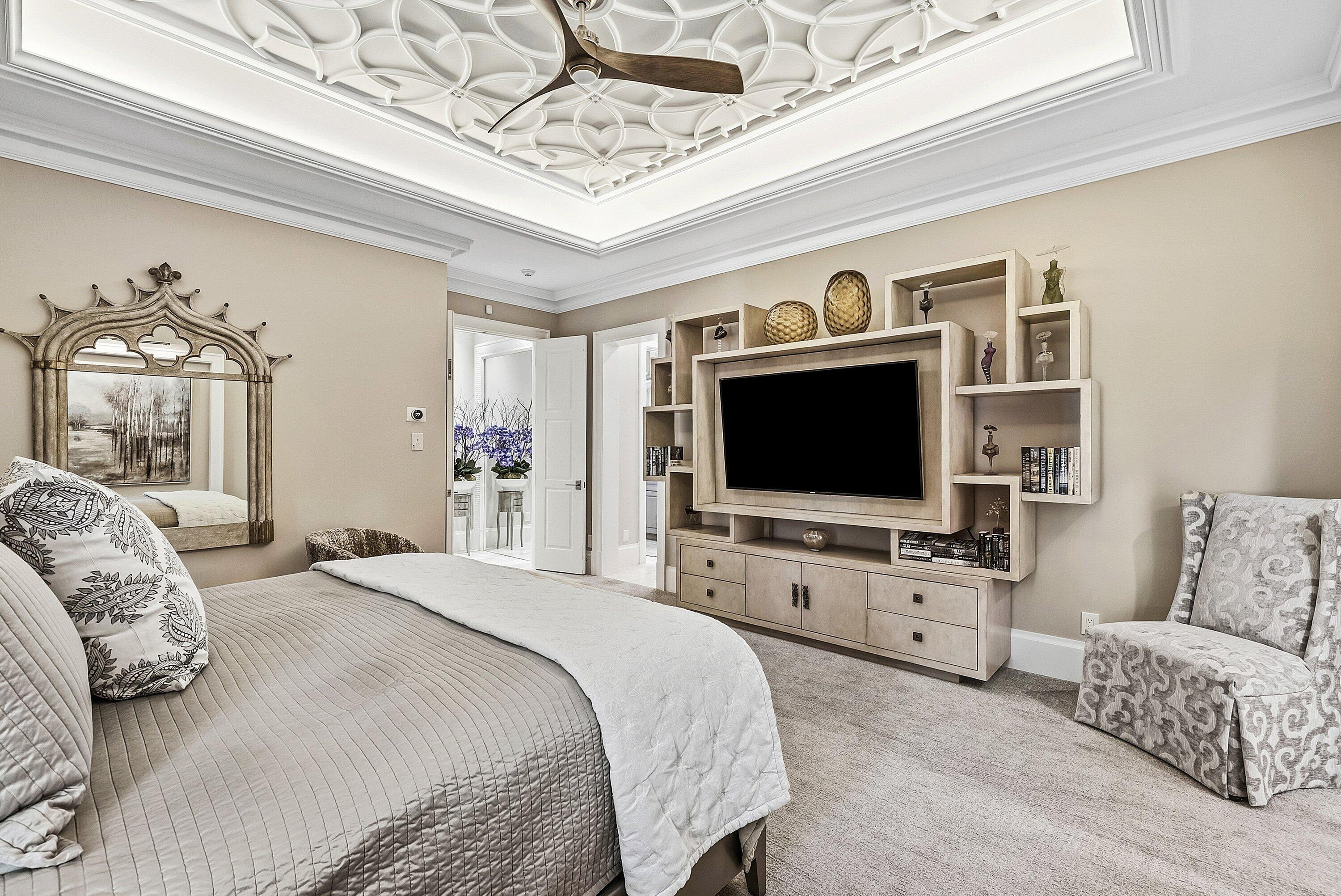 201 Northeast 3rd Court Boca Raton, FL 33432 - Photo 33 of 84 a bedroom with bed tv and couch