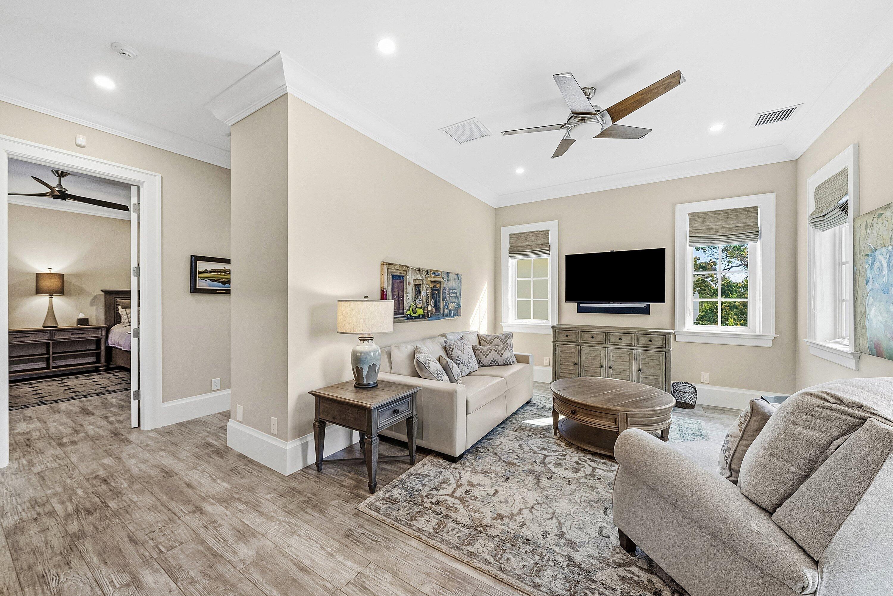 201 Northeast 3rd Court Boca Raton, FL 33432 - Photo 37 of 84 a living room with furniture and a flat screen tv