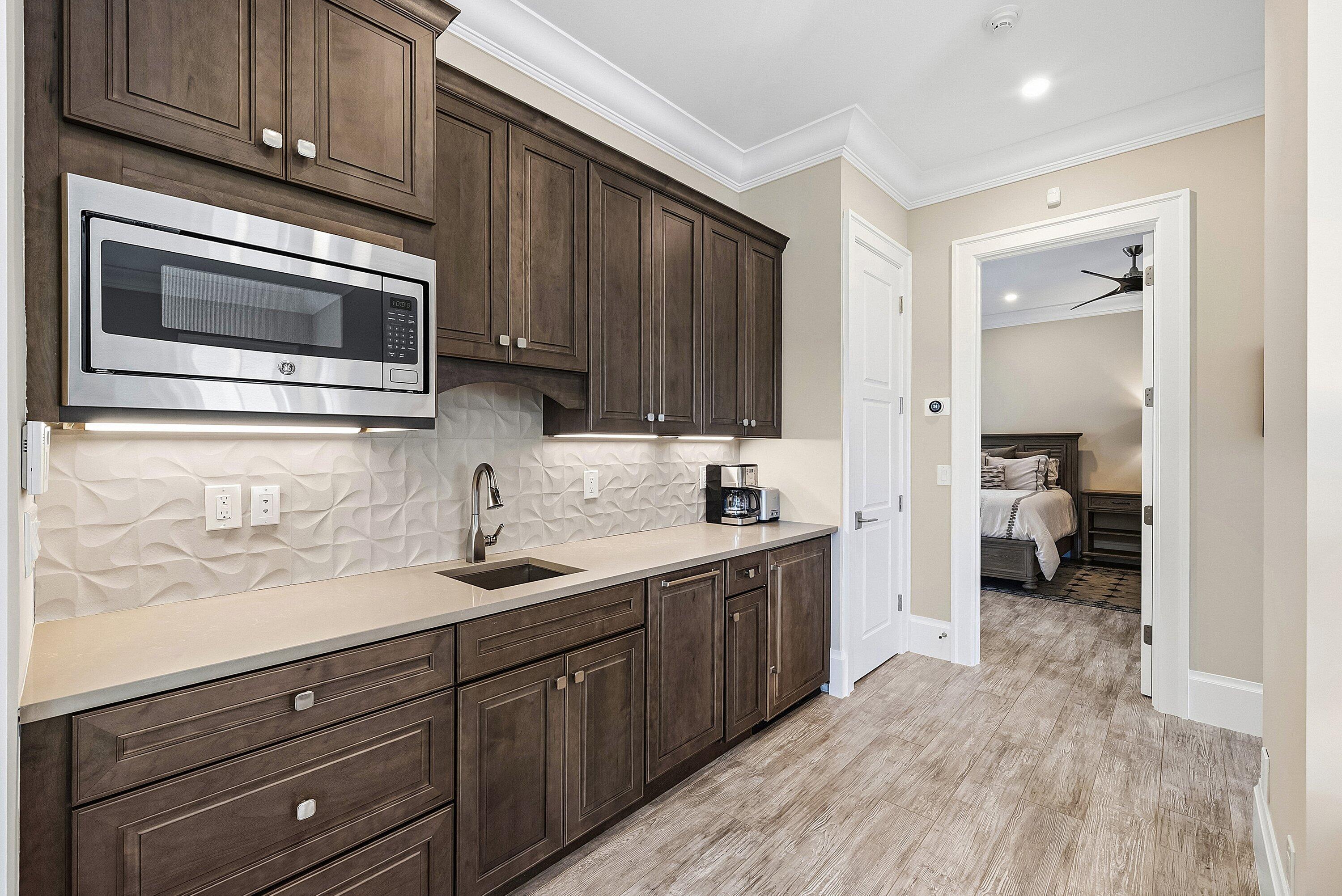 201 Northeast 3rd Court Boca Raton, FL 33432 - Photo 40 of 84 a kitchen with a sink and cabinets