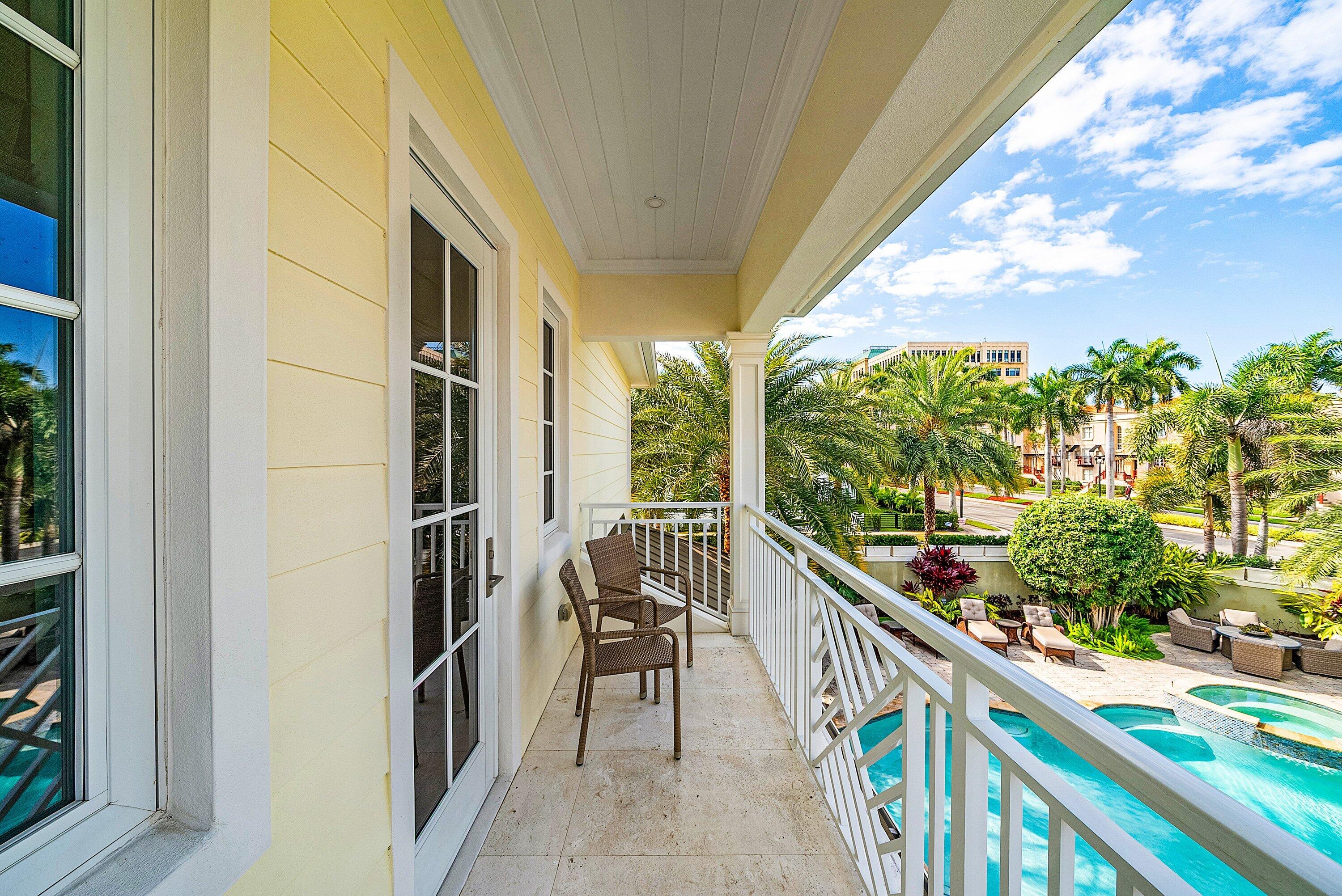 201 Northeast 3rd Court Boca Raton, FL 33432 - Photo 42 of 84 a view of a balcony with wooden floor