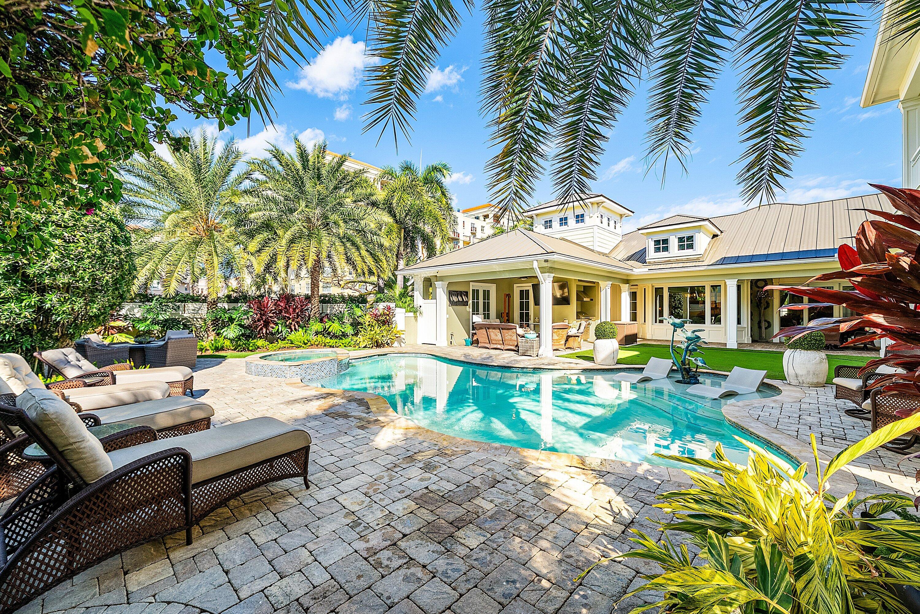 201 Northeast 3rd Court Boca Raton, FL 33432 - Photo 53 of 84 a view of a house with swimming pool and sitting area