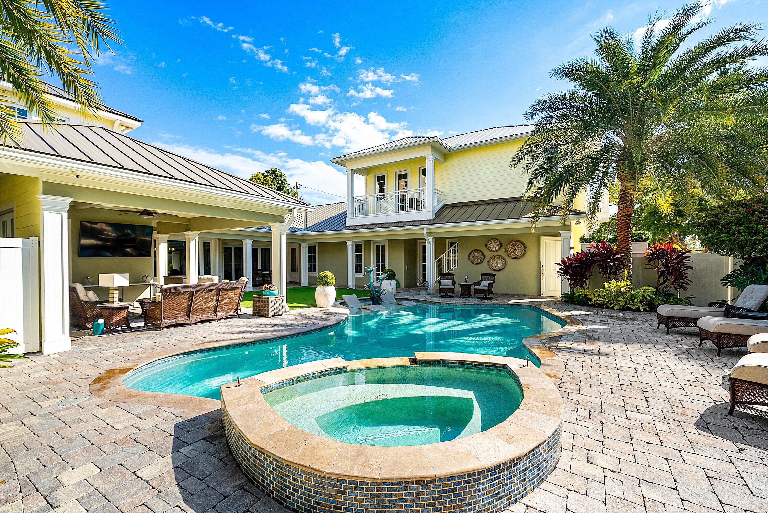 201 Northeast 3rd Court Boca Raton, FL 33432 - Photo 54 of 84 a view of a house with swimming pool and sitting area