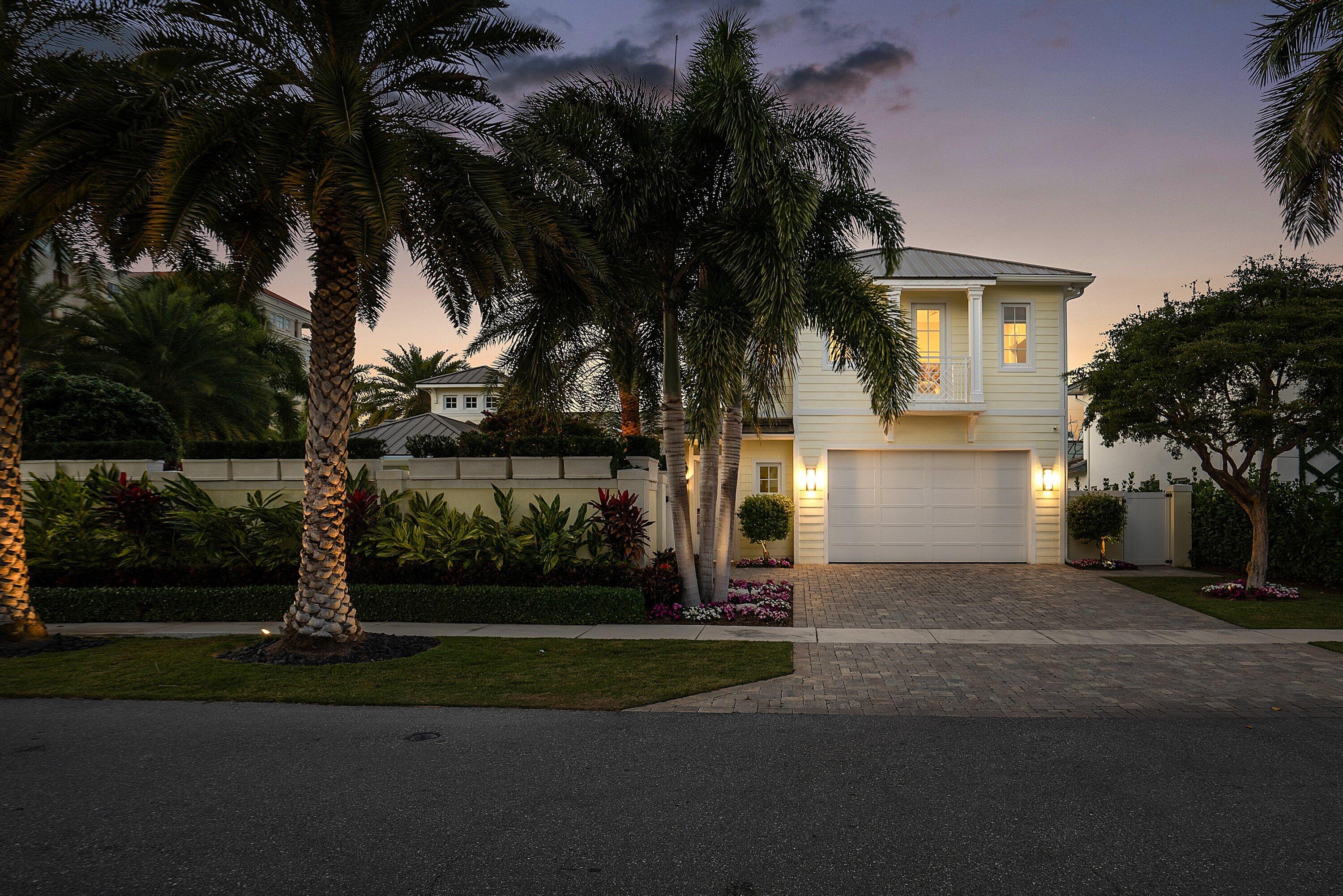 201 Northeast 3rd Court Boca Raton, FL 33432 - Photo 69 of 84 front view of a house with a yard and palm trees