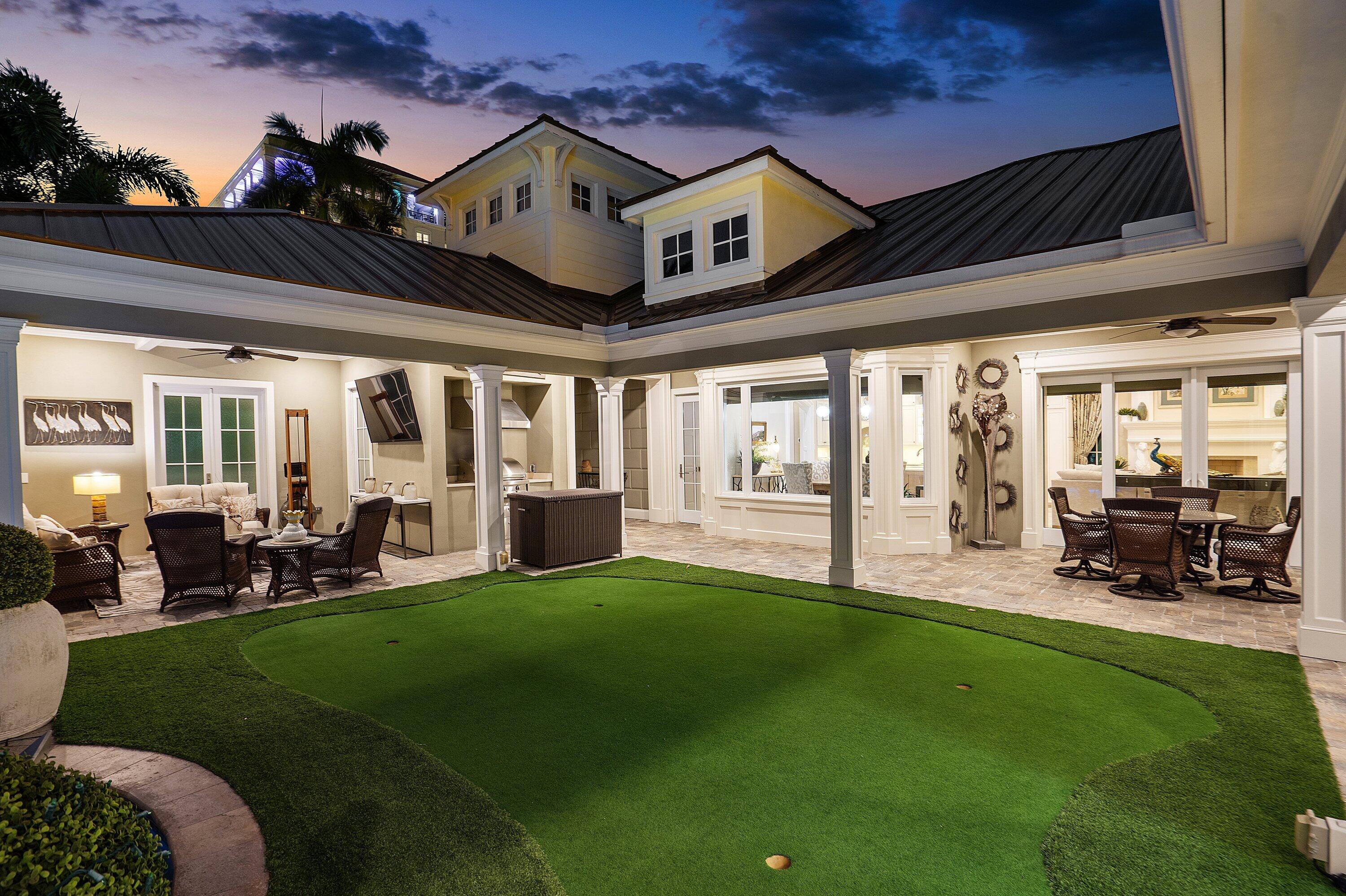 201 Northeast 3rd Court Boca Raton, FL 33432 - Photo 82 of 84 a view of a porch with chairs and backyard