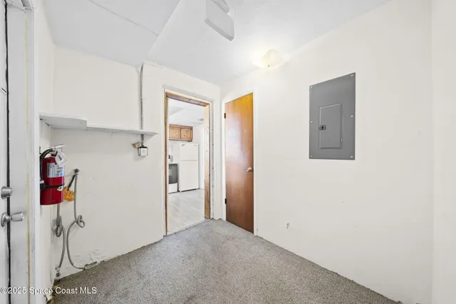 a view of a livingroom with wooden floor and closet