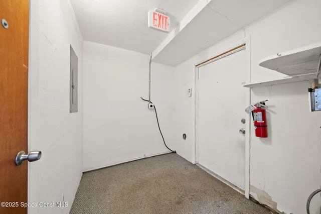 a view of a room with rack on the wall