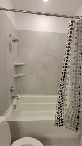 a bathroom with a bathtub