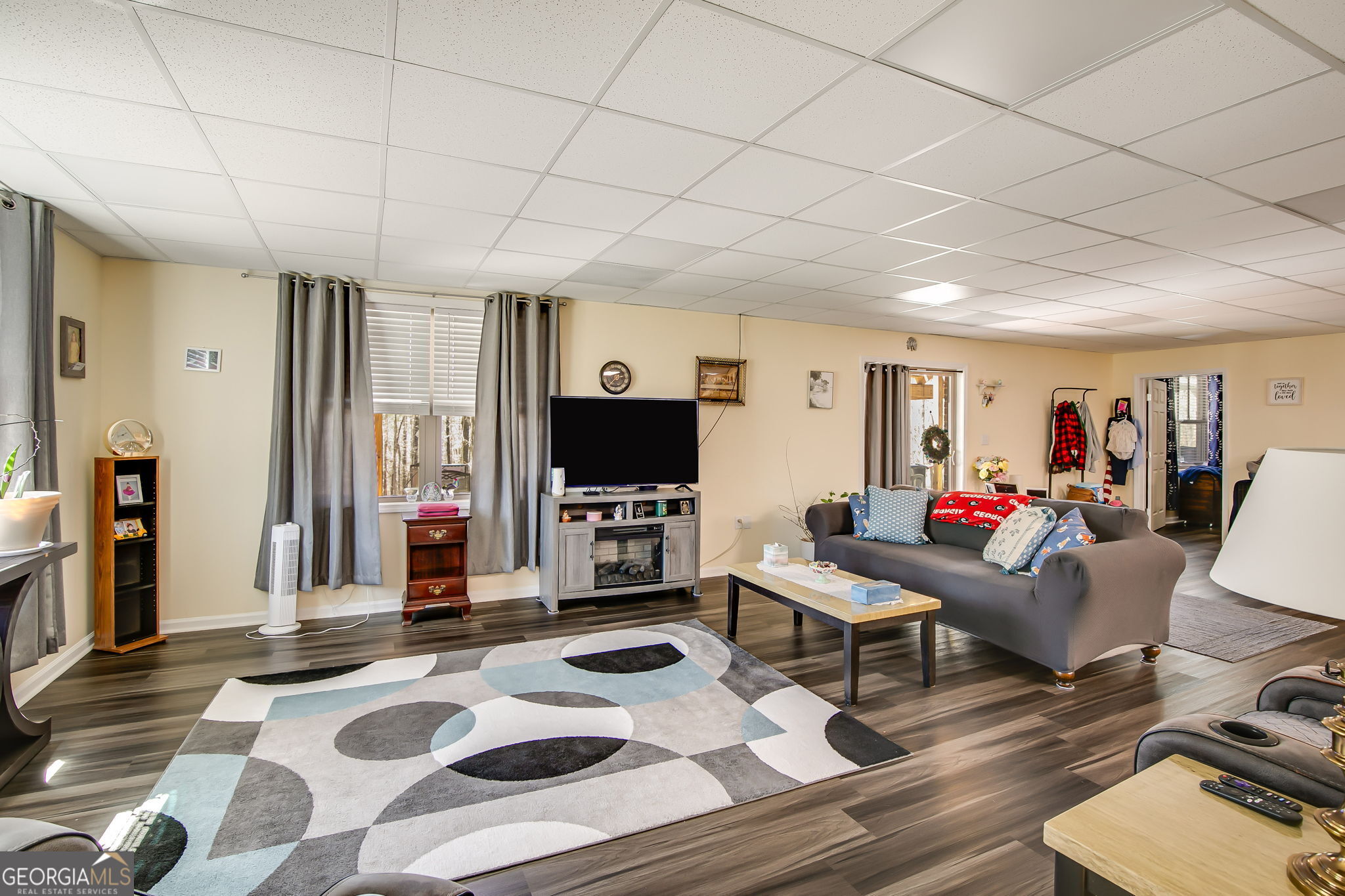 733 Cherry Road Franklin, GA 30217 - Photo 18 of 22 a living room with furniture and a flat screen tv