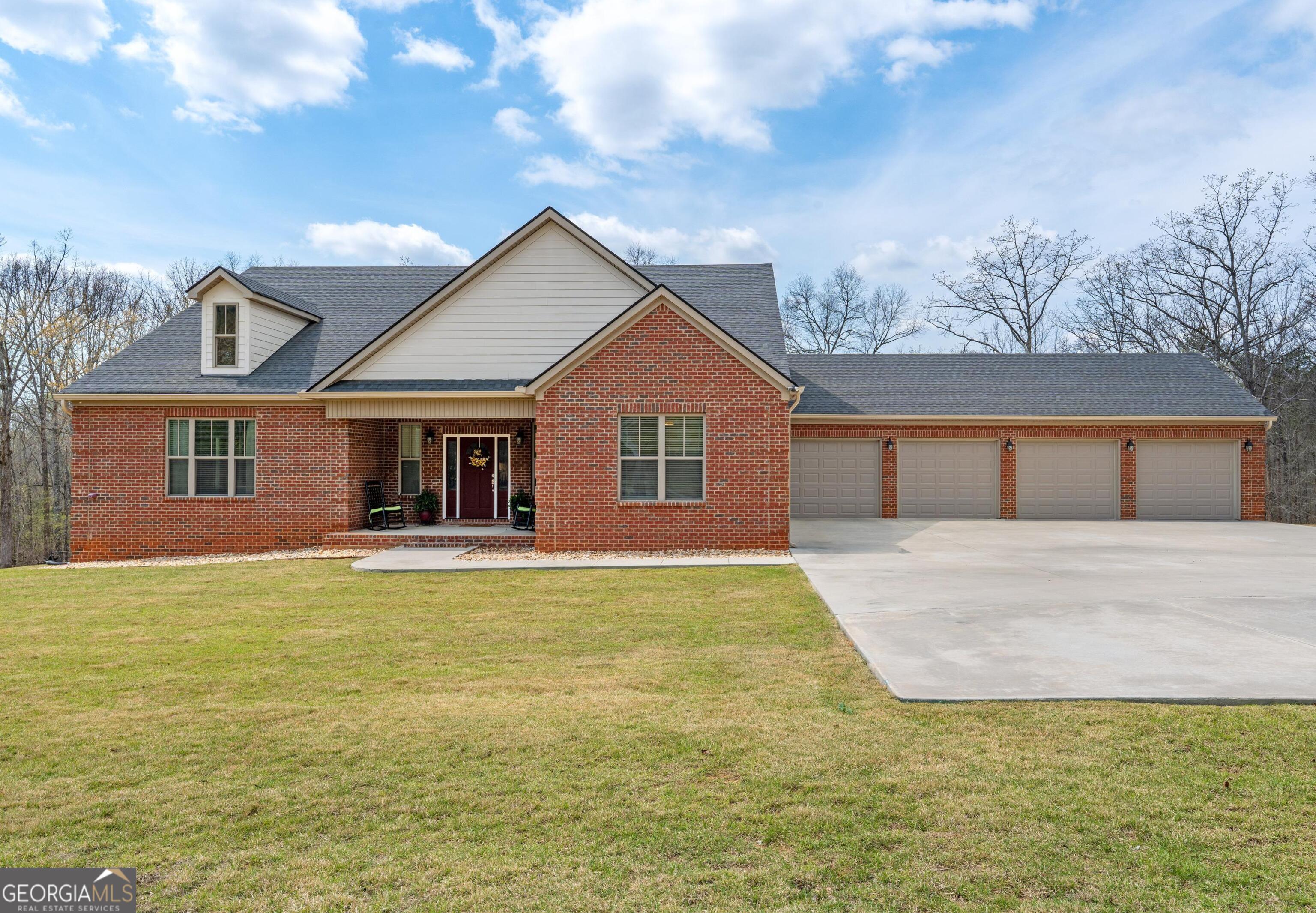 733 Cherry Road Franklin, GA 30217 - Photo 2 of 88 a front view of a house with yard