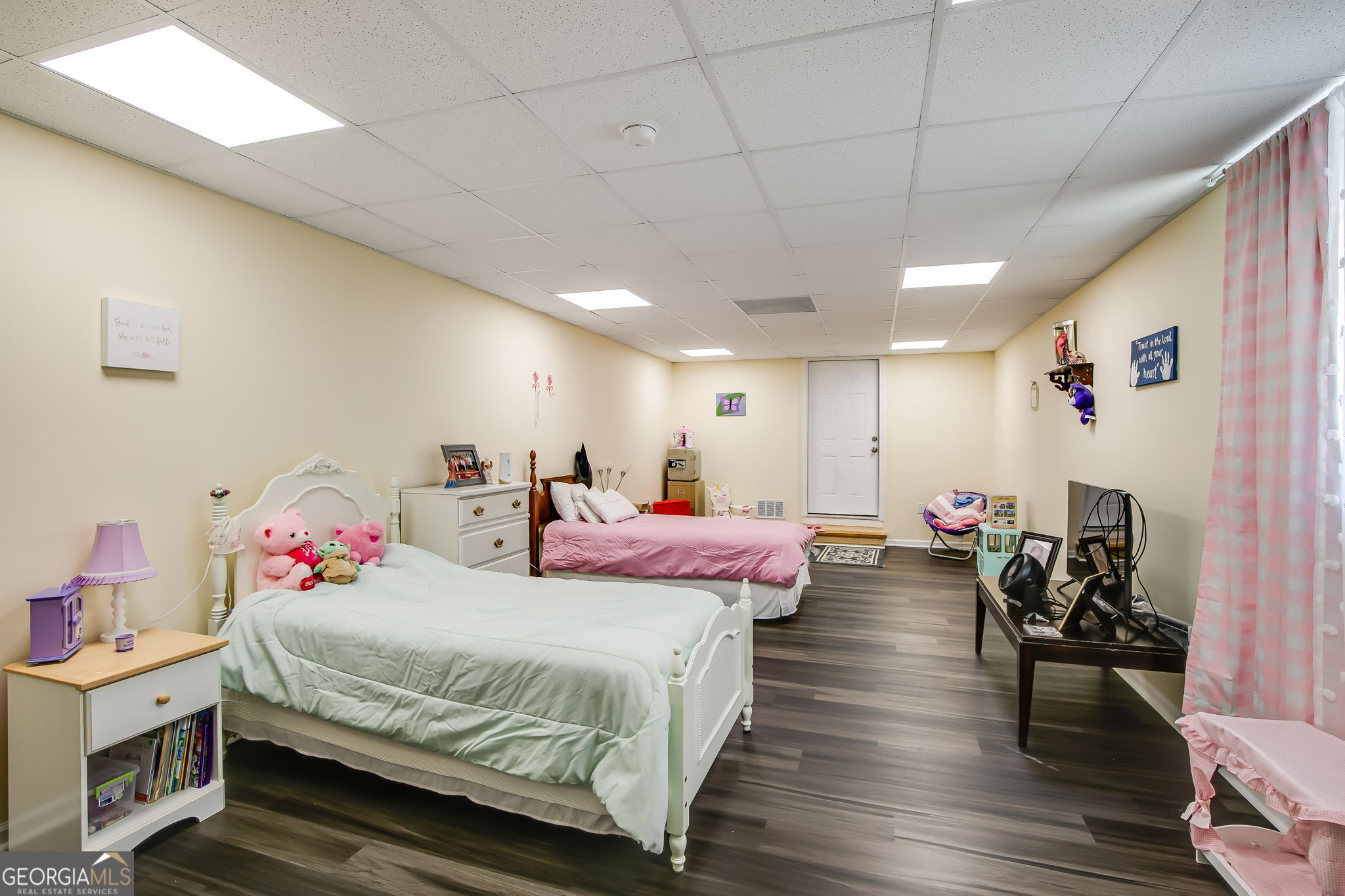 733 Cherry Road Franklin, GA 30217 - Photo 21 of 22 a spacious bedroom with bed and a couch