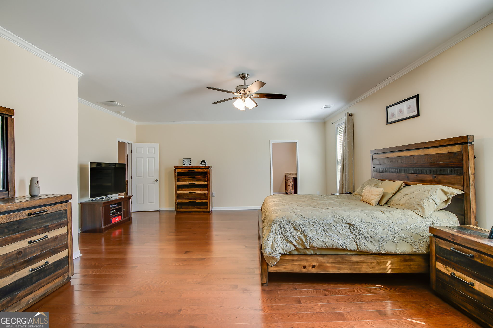 733 Cherry Road Franklin, GA 30217 - Photo 24 of 88 a bedroom with a bed and flat screen tv