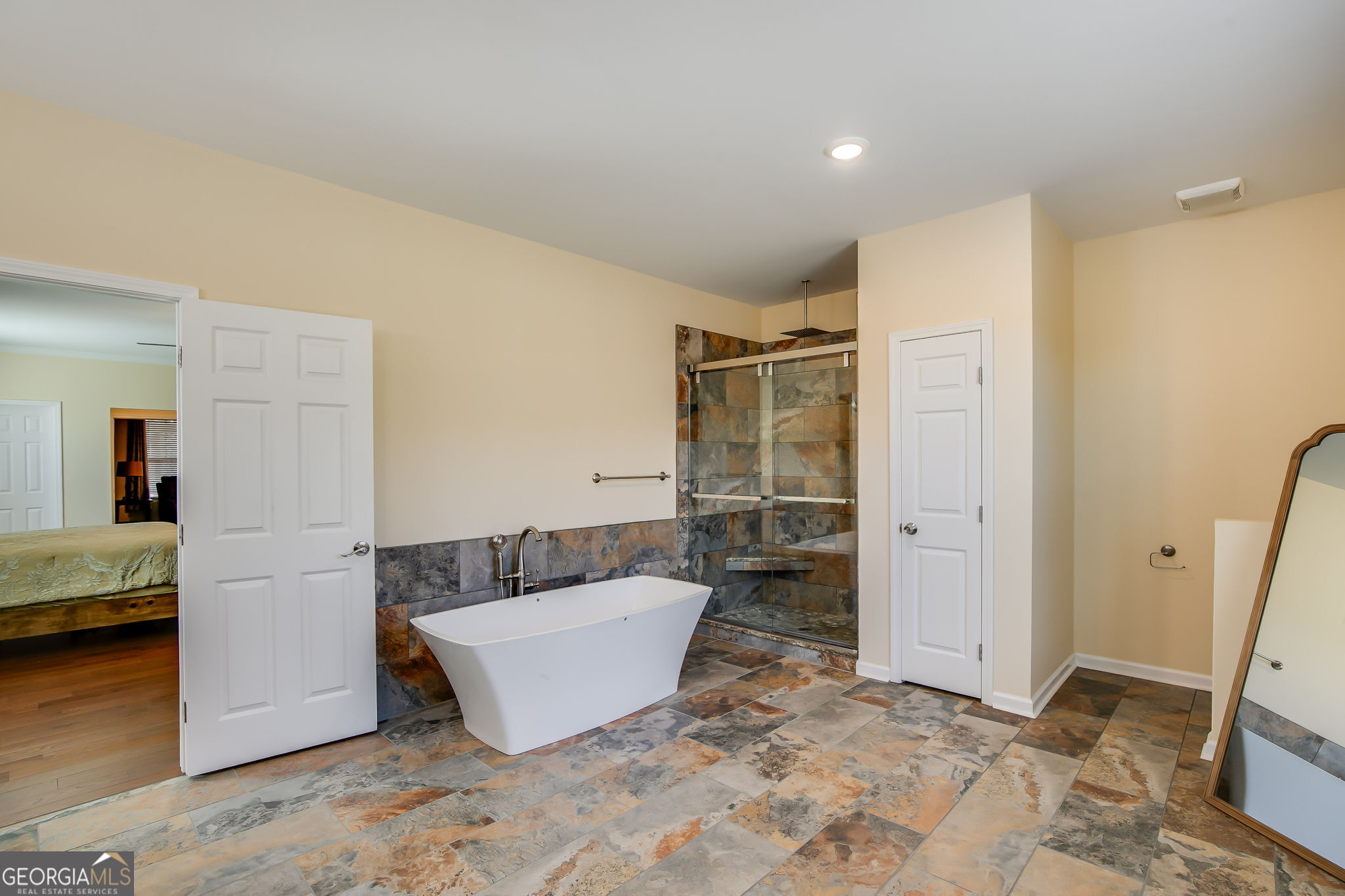 733 Cherry Road Franklin, GA 30217 - Photo 26 of 88 a spacious bathroom with a tub and shower