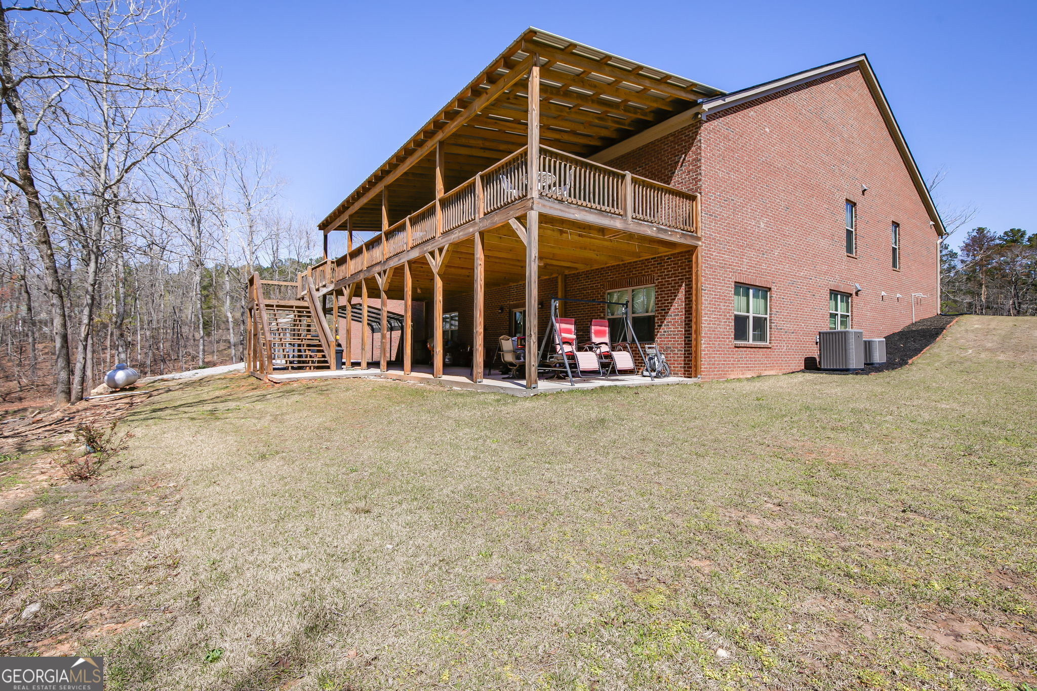 733 Cherry Road Franklin, GA 30217 - Photo 3 of 88 a view of a large building with large windows