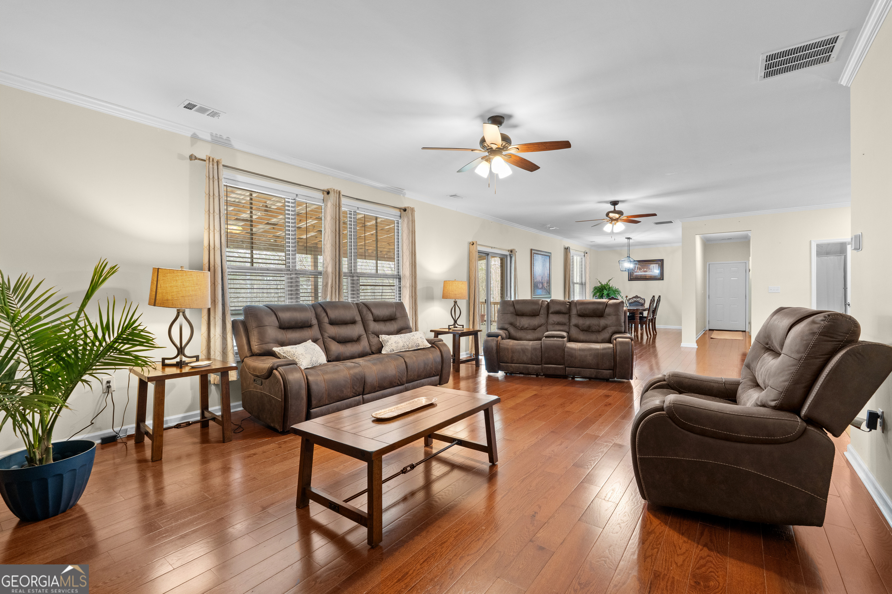 733 Cherry Road Franklin, GA 30217 - Photo 31 of 88 a living room with furniture a wooden floor and a window