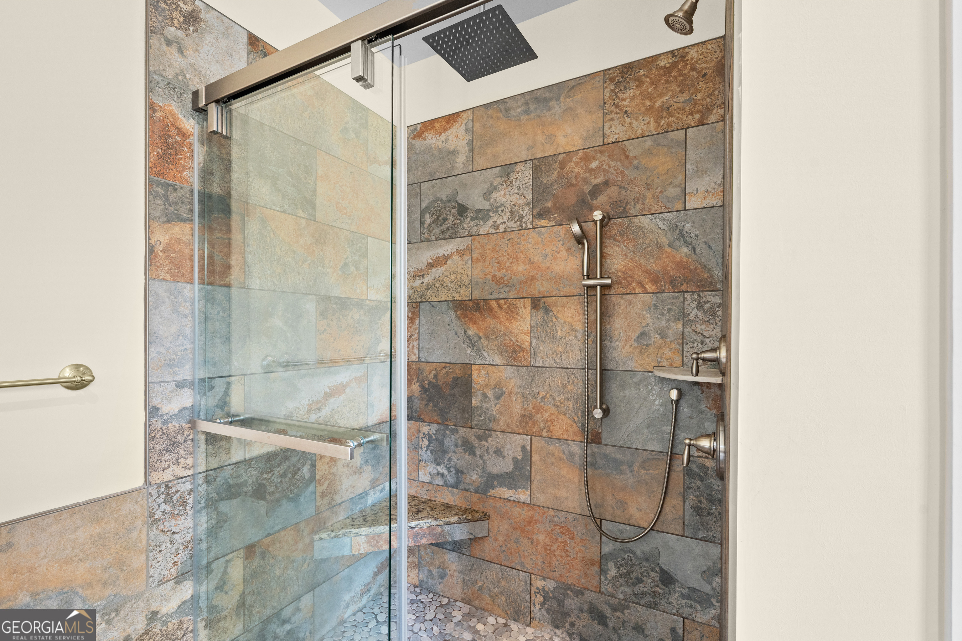 733 Cherry Road Franklin, GA 30217 - Photo 44 of 88 a bathroom with a glass shower door