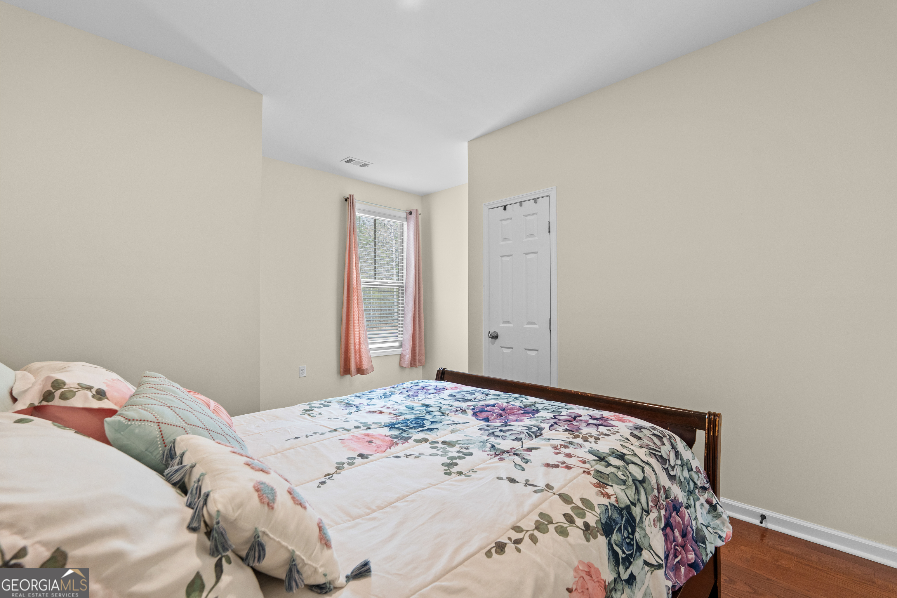 733 Cherry Road Franklin, GA 30217 - Photo 50 of 88 a bedroom with a bed and a window