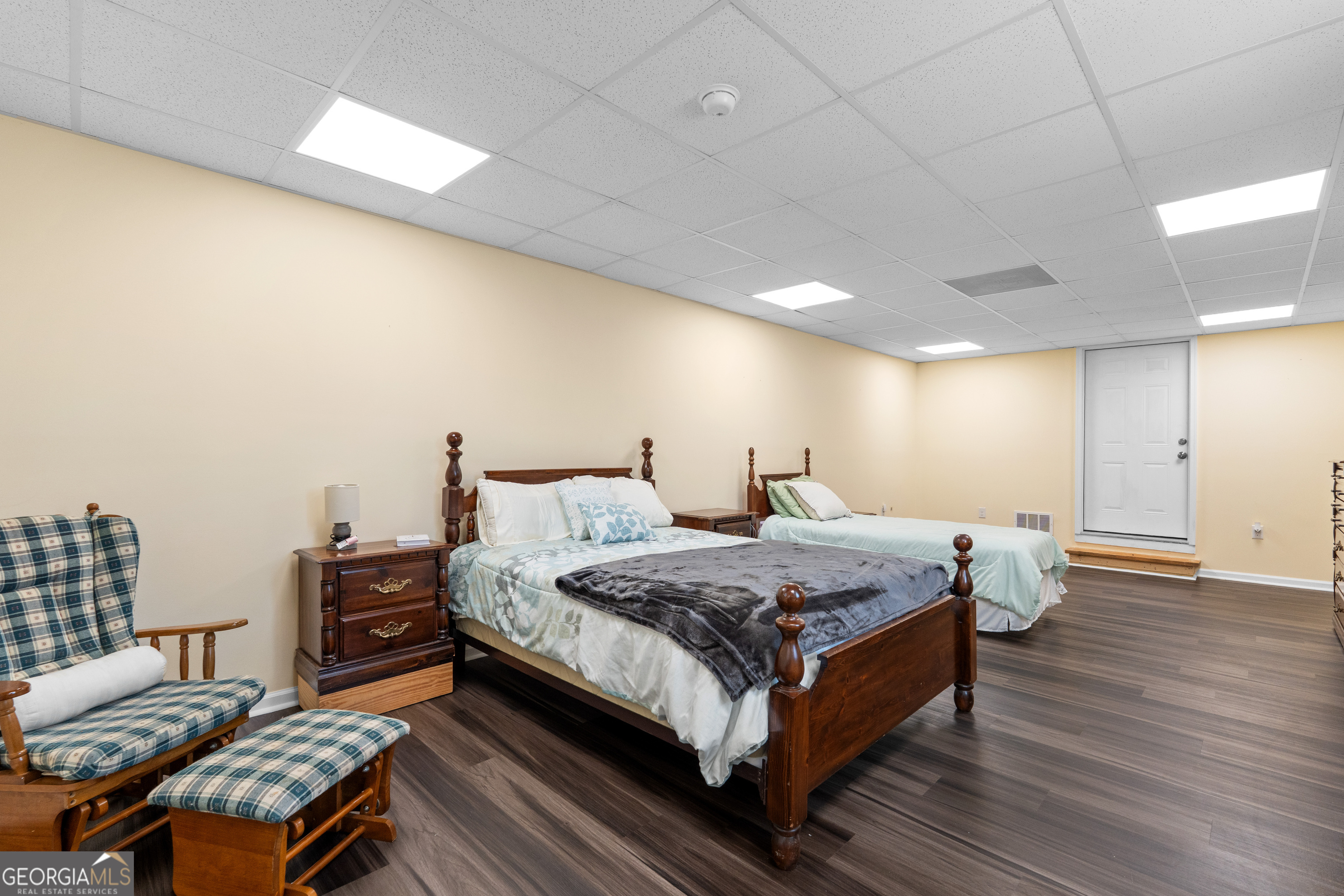 733 Cherry Road Franklin, GA 30217 - Photo 58 of 88 a bedroom with bed and wooden floor