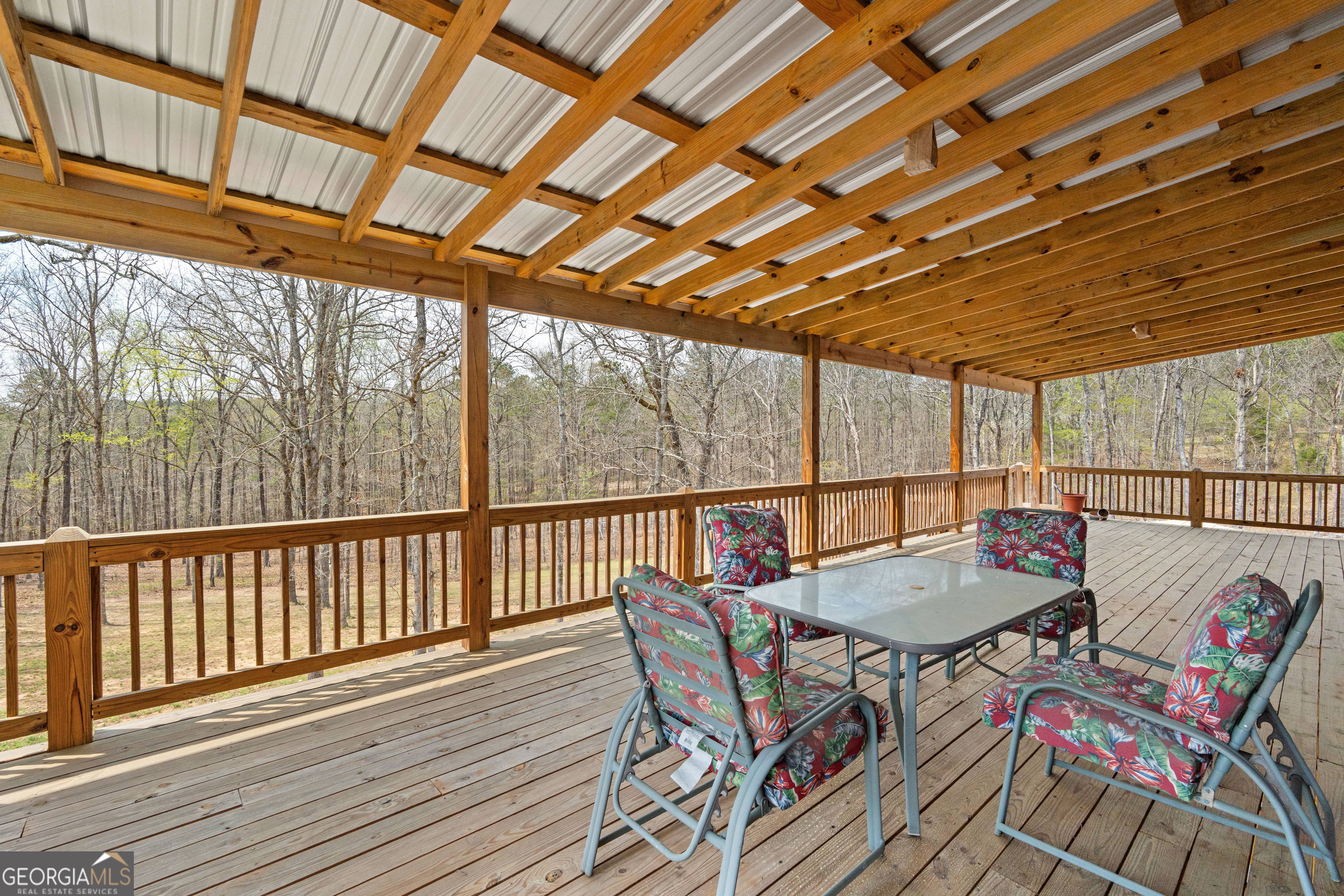733 Cherry Road Franklin, GA 30217 - Photo 64 of 88 a balcony with furniture and wooden floor