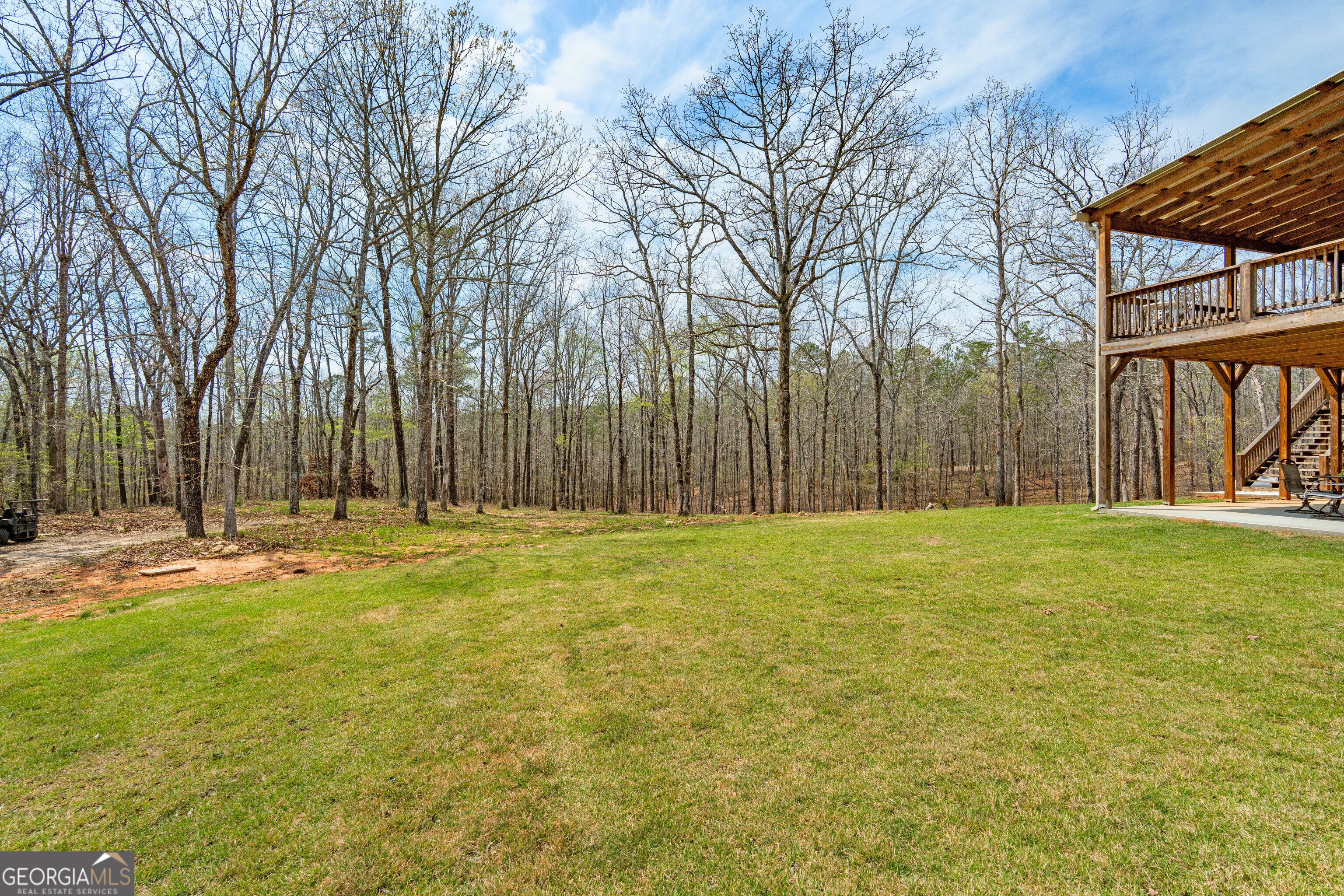 733 Cherry Road Franklin, GA 30217 - Photo 68 of 88 a view of swimming pool with an outdoor space and seating area