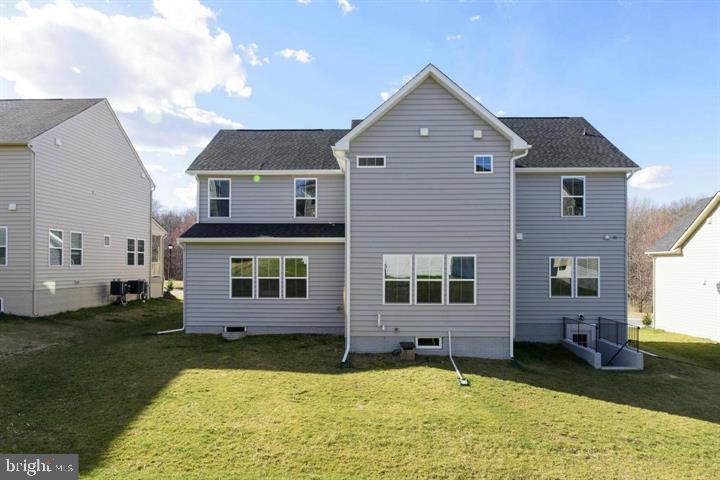 10431 Windlass Run Road Baltimore, MD 21220 - Photo 30 of 30 a view of a house with a yard