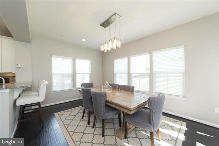 10431 Windlass Run Road Baltimore, MD 21220 - Photo 8 of 30 a view of a dining room with furniture window and outside view