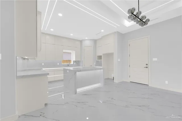 a bathroom with a toilet sink vanity and mirror