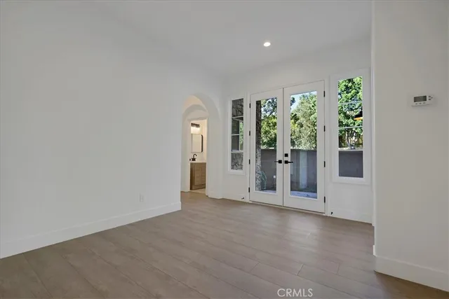 an empty room with windows