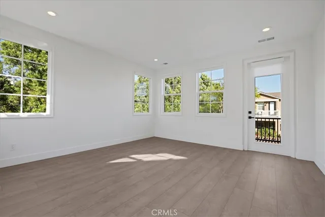 a view of a hallway with stairs