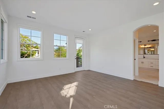 a view of a porch with wooden floor