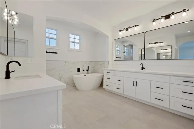 a view of a backyard with sitting area