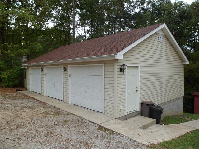 4486 Sears Road Pegram, TN 37143 - Photo 2 of 20 Huge 36x24 3 car garage with overhead storage