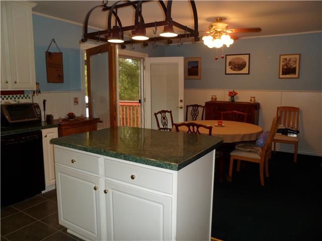 4486 Sears Road Pegram, TN 37143 - Photo 10 of 20 Dining room opens up to the back deck